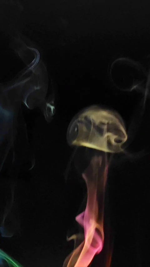 Colored smoke on abstract black background Stock Footage 293252594