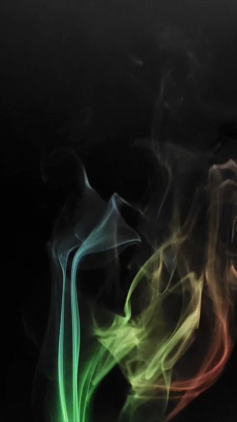 Colored smoke on abstract black background Stock Footage 293252612