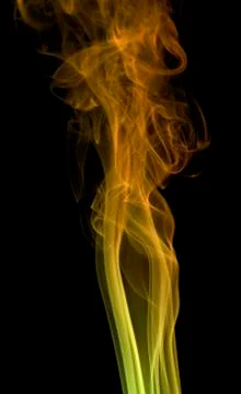Colored smoke in black back Stock Photos
