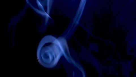 Colored smoke on a black background Stock Footage 249821200