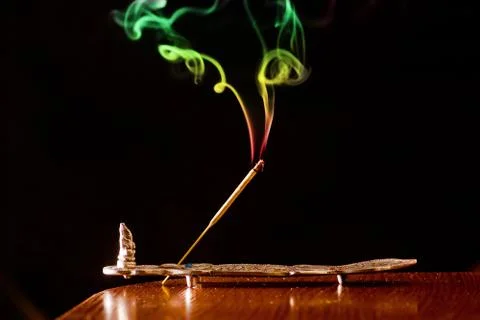 Colored smoke on a black background Stock Photos
