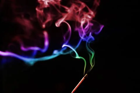Colored smoke on a black background Stock Photos