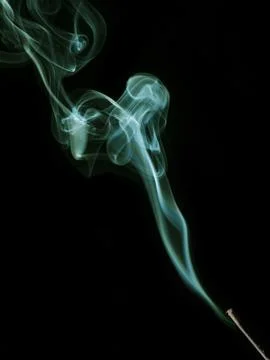 Colored smoke on a black background Stock Photos