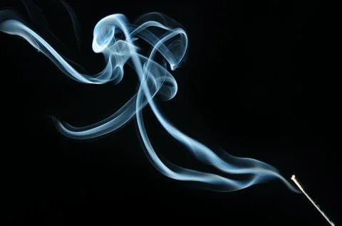 Colored smoke on a black background Stock Photos