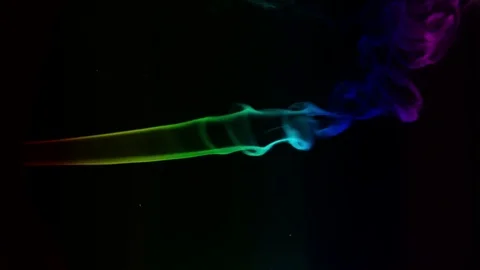 Colored smoke curves isolated on black background Stock Footage 82128690
