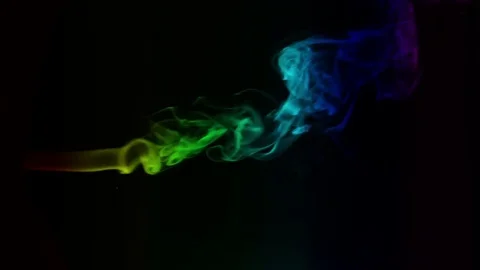 Colored smoke curves isolated on black background Stock Footage 82129039