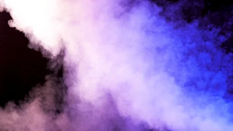 Colored smoke over a black background Stock Footage 96339323