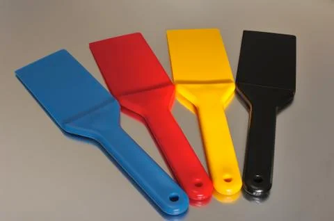 Colored spatulas Stock Photos