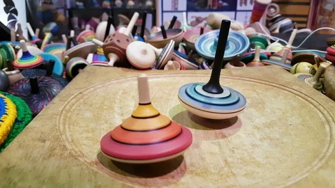 Colored spinning tops rotate 스톡 동영상 88152974