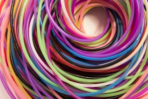 Colored spiral of thread on a white background Stock Photos