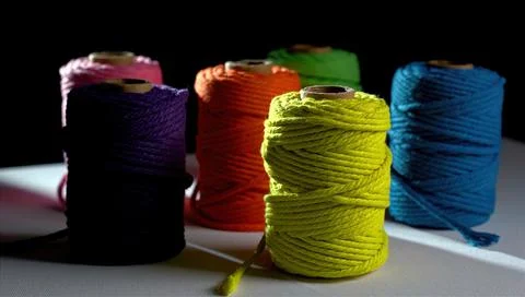 Colored spools of thread on a white background, sewing, space for text Stock Photos