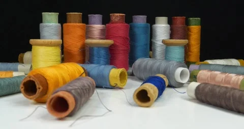 Colored spools of a threads Stock Footage 323084481