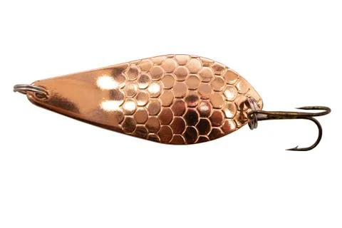 Colored spoon-baits and wobblers for fishing is in a fishing box on a wooden  Stock Photos
