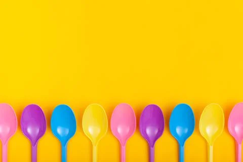 Colored spoons Stock Photos