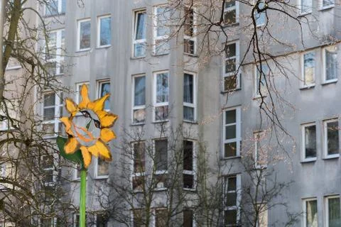 The colored spot in front of the gray facade Stock Photos