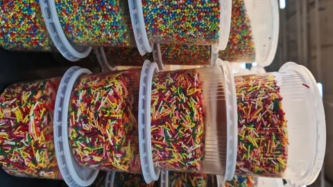 Colored sprinkles for Easter cake. Sugar sprinkles Stock Footage 271535566