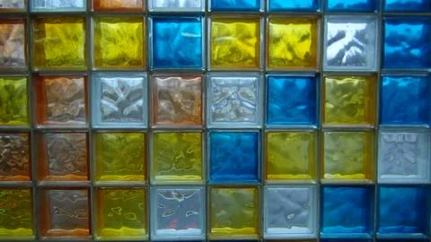 Colored square glass cubes embedded in the building Stock Photos