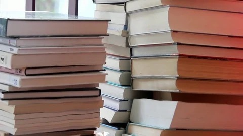 Colored Stacking Book. Camera Moves Down Stock Footage 72452674