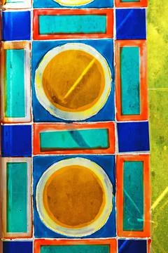 Colored stained glass. Geometric patterns on glass. Foto stock