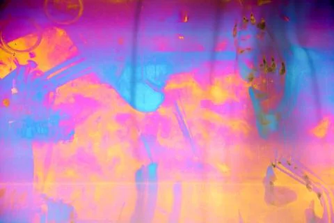 Colored stains on iron surface. The interference of light. Background Stock Photos