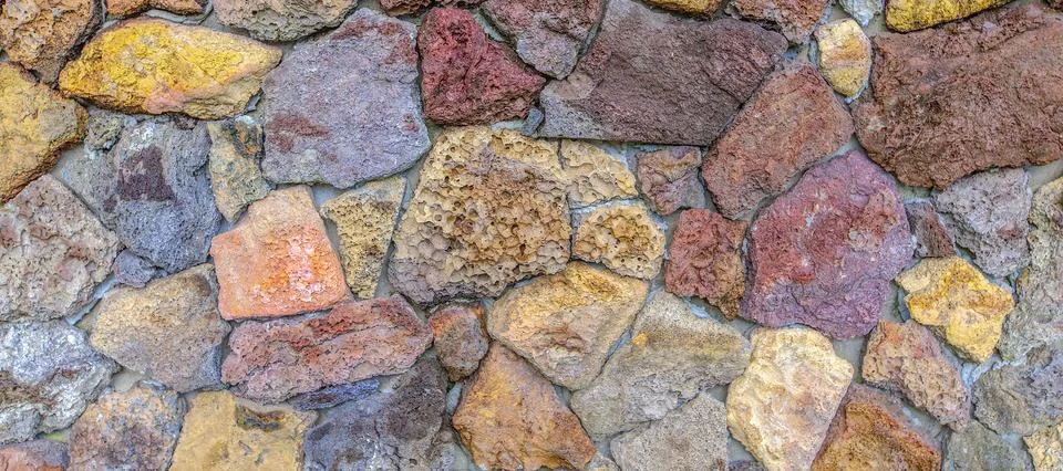 Colored Stone wall texture pattern background Stock Photos