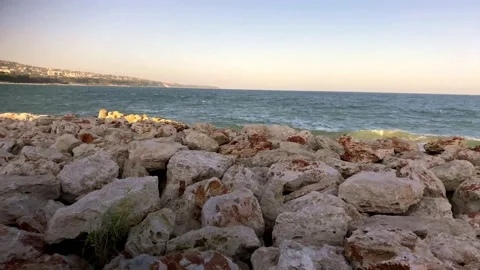 Colored Stones On The Beach. Large Piece Of Rock On Sea. Stock Footage 149933210