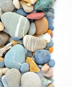 Colored stones on white background Stock Photos