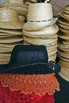 Colored straw hats Stock Photos