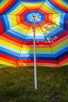Colored sun umbrella Stock Photos