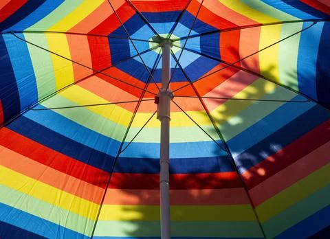 Colored sun umbrella Stock Photos