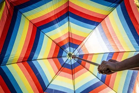 Colored sun umbrella Stock Photos