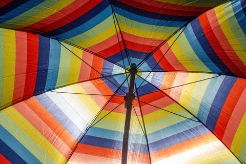 Colored sun umbrella Stock Photos