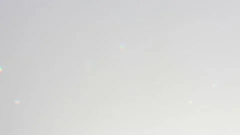 Colored sunbeams on a gray concrete wall move chaotically slowly Stock Footage 172479205