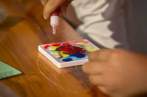Colored tempera used by a Child 写真素材