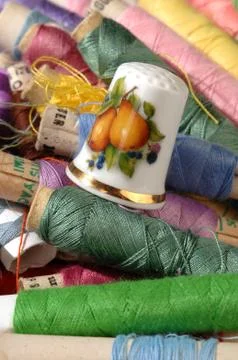 Colored thread and thimble Stock Photos