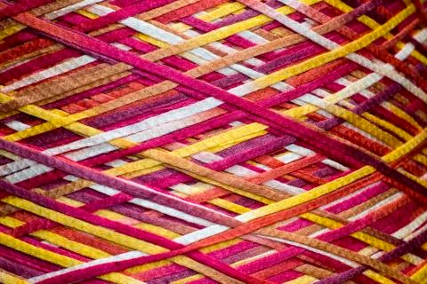 Colored thread on a bobbin texture Stock Photos