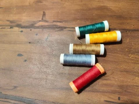Colored thread spools Stock Photos