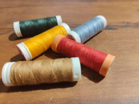 Colored thread spools Stock Photos
