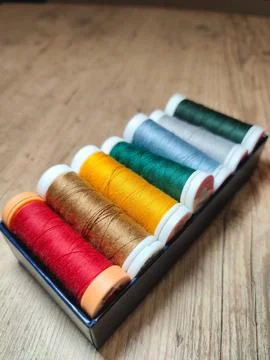 Colored thread spools Stock Photos