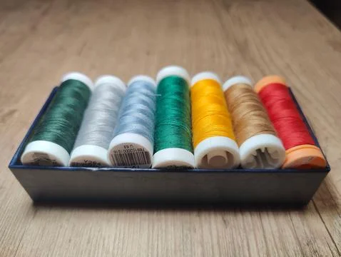 Colored thread spools Stock Photos