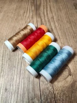 Colored thread spools Stock Photos
