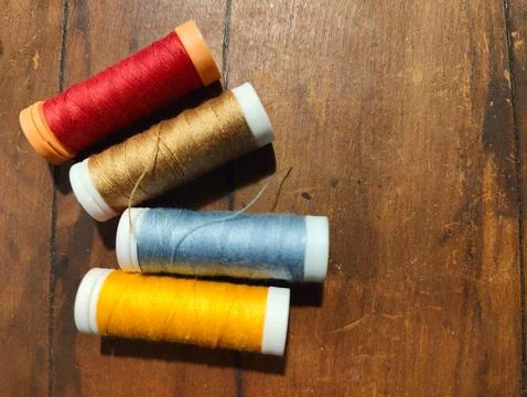 Colored thread spools Stock Photos