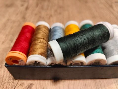 Colored thread spools Stock Photos