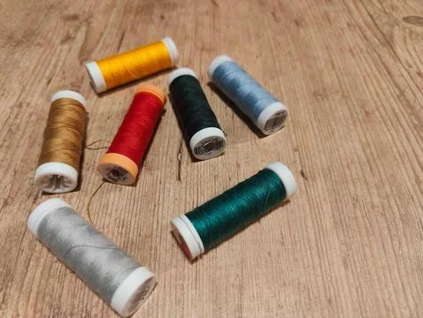 Colored thread spools Stock Photos