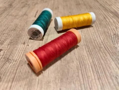 Colored thread spools Stock Photos