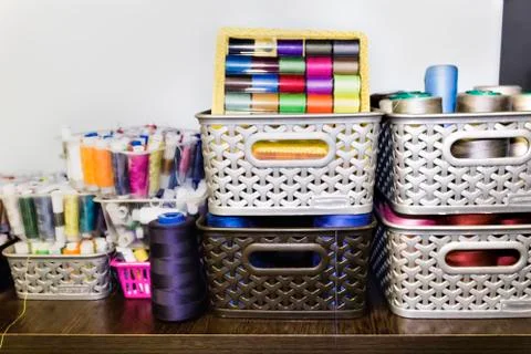 Colored threads in the basket Stock Photos