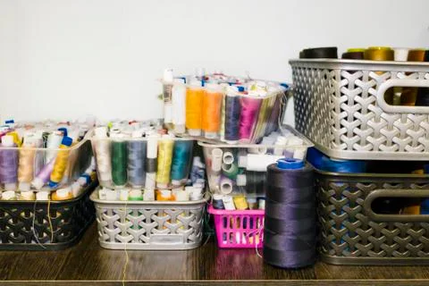 Colored threads in the basket Stock Photos