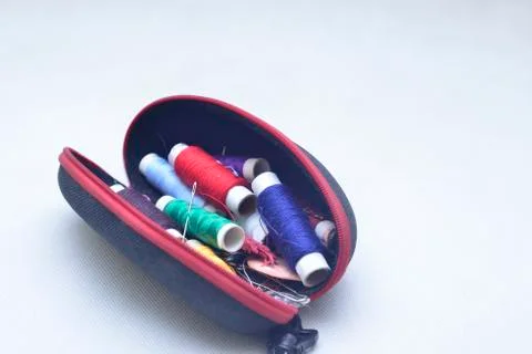 Colored threads with needles Foto stock