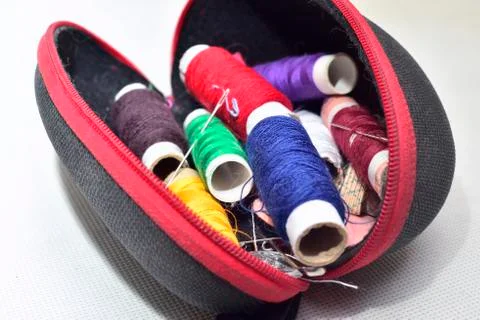 Colored threads with needles Stock Photos