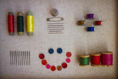 Colored threads on old coils. Stock Photos